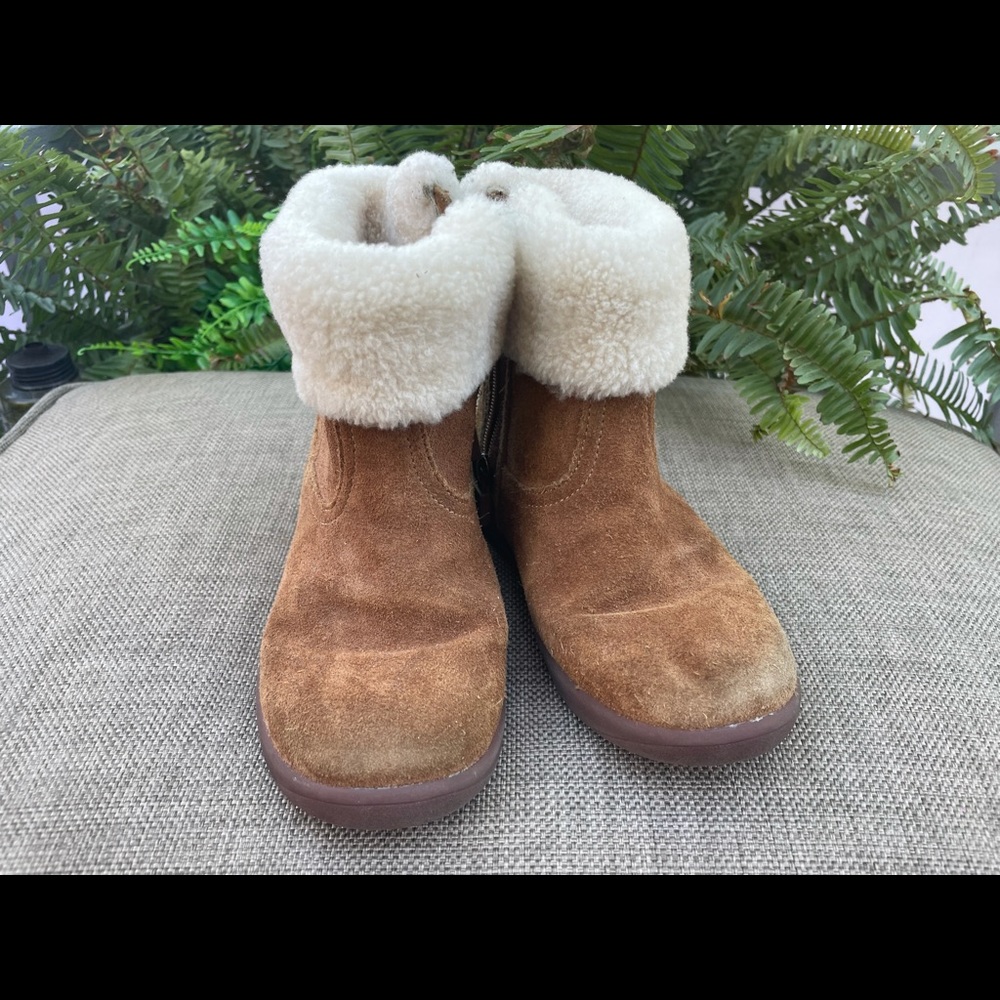 UGG Jorie fluffy trim boot makes a cold-weather statement. Super-soft lining